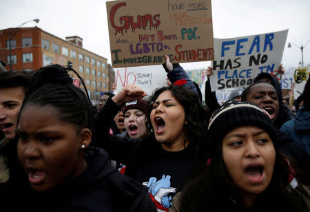 FILE PHOTO: Students and gun control advocates attend the "March for Our Lives" event after recent school shootings, at a rally in in Chicago, Illinois, U.S., March 24, 2018. REUTERS/Joshua Lott/File Photo