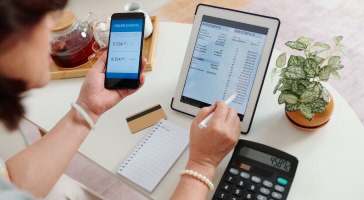 Woman checking her brokerage account