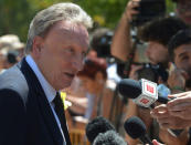 Cardiff City manager Neil Warnock speaks to the press outside of the wake of soccer player Emiliano Sala in Progreso, Argentina February 16, 2019. REUTERS/Sebastian Granata