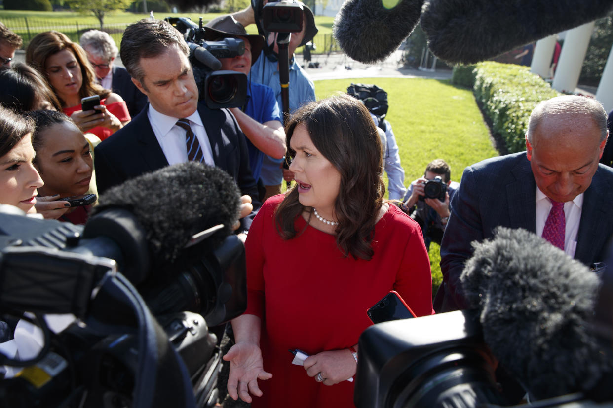 Press secretary Sarah Sanders talks to reporters outside the White House on May 3. (Photo: Evan Vucci/AP)