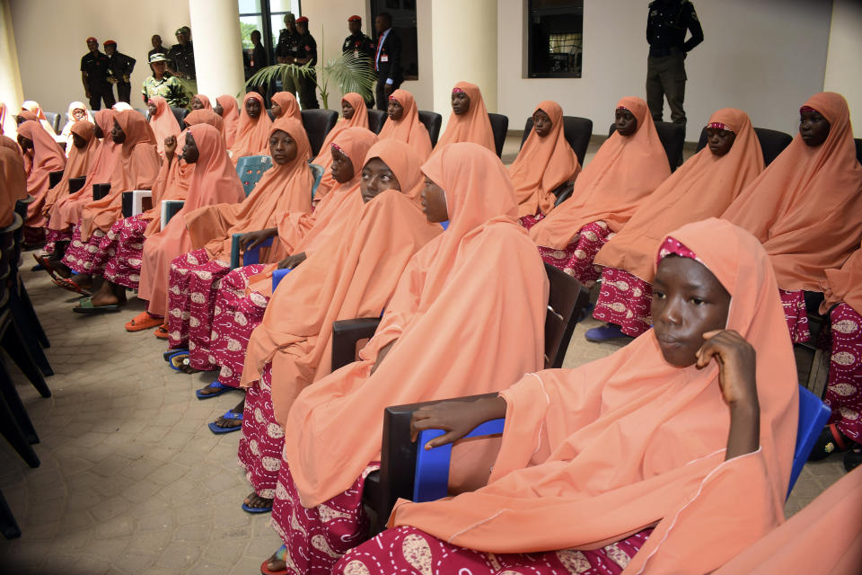 The freed students of the LEA Primary and Secondary School Kuriga upon their arrival at the state government house in Kaduna, Nigeria, Monday, March 25, 2024. More than 130 Nigerian schoolchildren rescued after more than two weeks in captivity have arrived in their home state in northwestern Nigeria ahead of their anticipated reunions with families. (AP Photo/Habila Darofai)