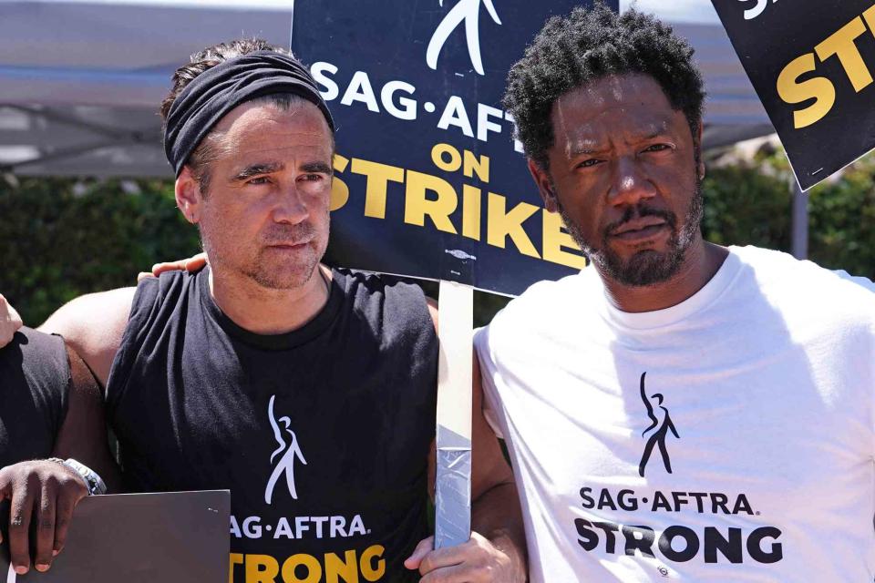 <p>Hollywood To You/Star Max/GC Images</p> Colin Farrell and Tory Kittles walk the picket line for the SAG-AFTRA