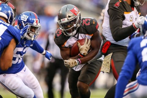 Tampa Bay Buccaneers running back Peyton Barber (25) rushes for a touchdown past New York Giants outside linebacker Alec Ogletree (52) during the second half at MetLife Stadium - Credit: Vincent Carchietta/USA TODAY