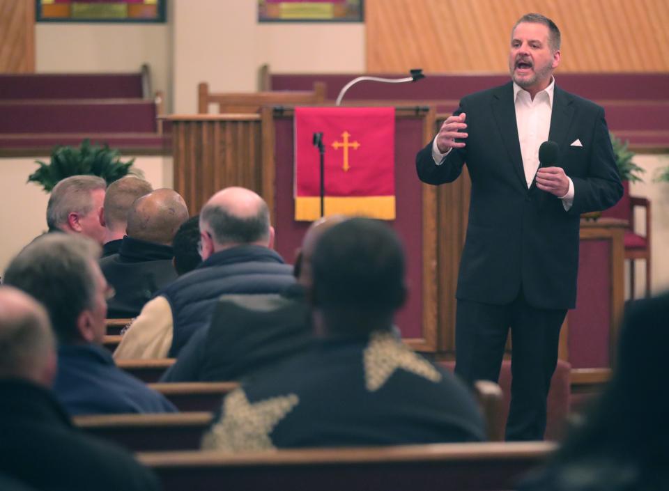 Akron Chief Prosecutor Craig Morgan talks to a community conversation gathering Wednesday at New Hope Baptist Church.