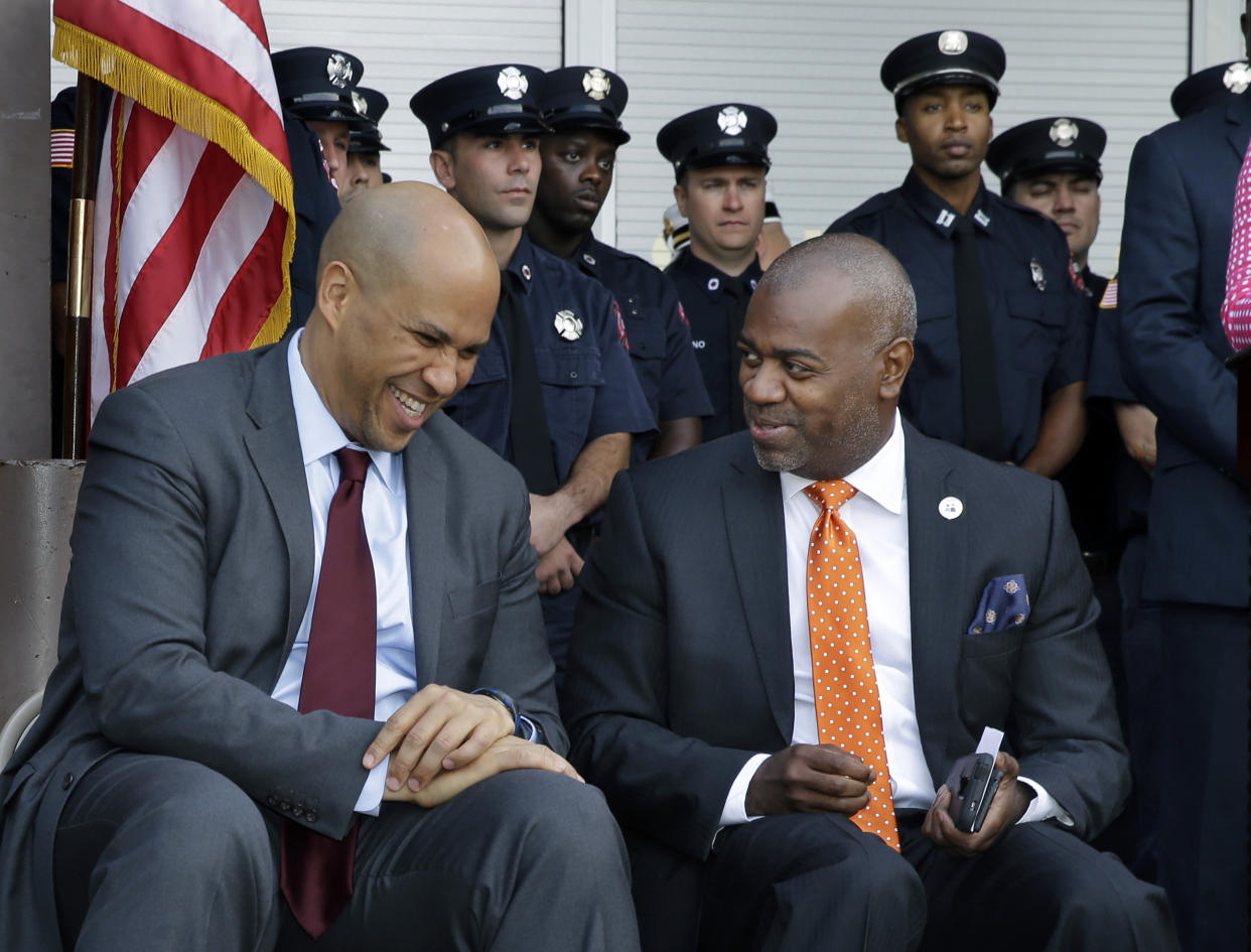 Ras Baraka, right, and former Newark Mayor, Sen. Cory Booker 