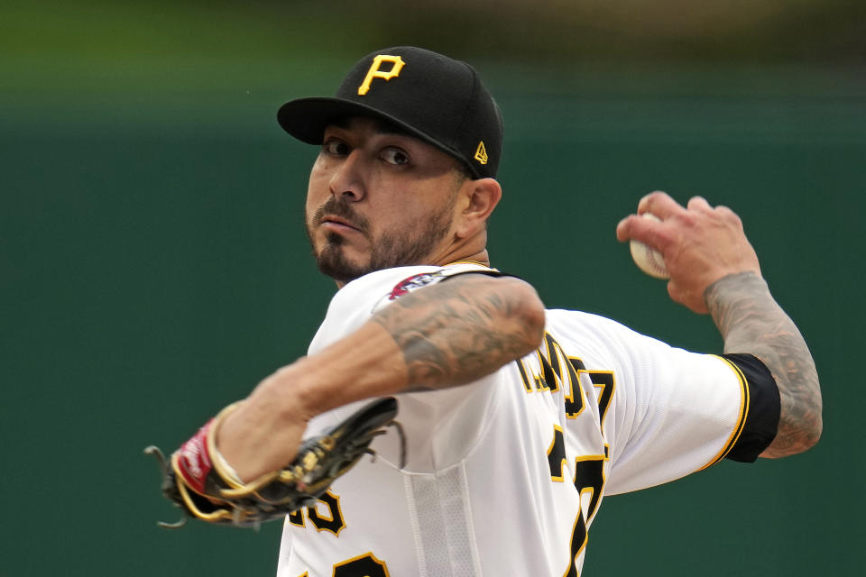 Pittsburgh Pirates starting pitcher Vince Velasquez delivers during the first inning of baseball game against the Cincinnati Reds in Pittsburgh, Sunday, April 23, 2023. (AP Photo/Gene J. Puskar)