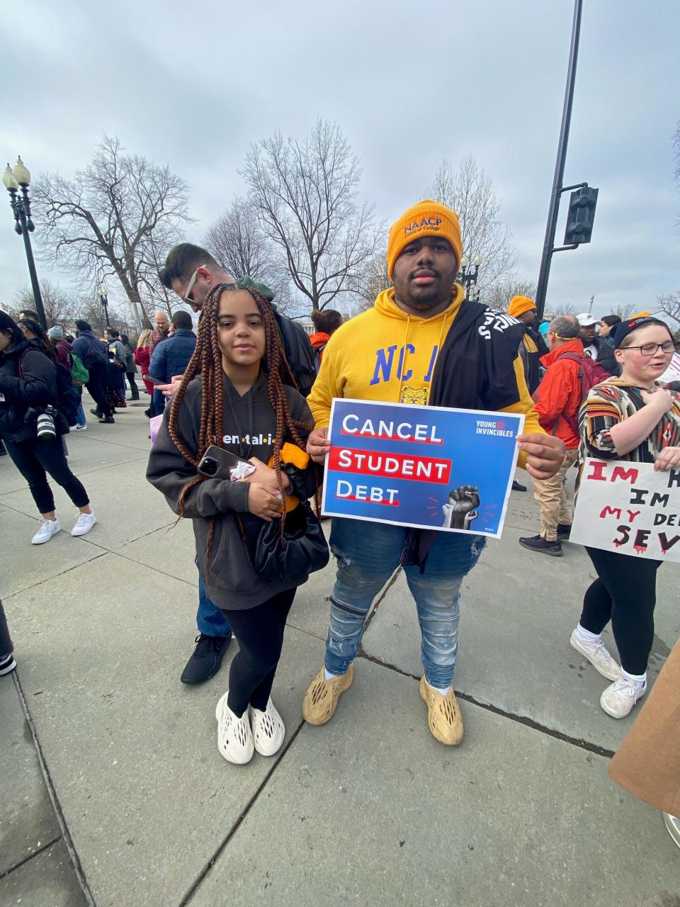 Justice Stanton, left, and Antwan McPherson, both 19 and freshmen at North Carolina A&T, stand outside the Supreme Court Tuesday, hoping that President Joe Biden's student loan debt forgiveness plan isn't permanently blocked.