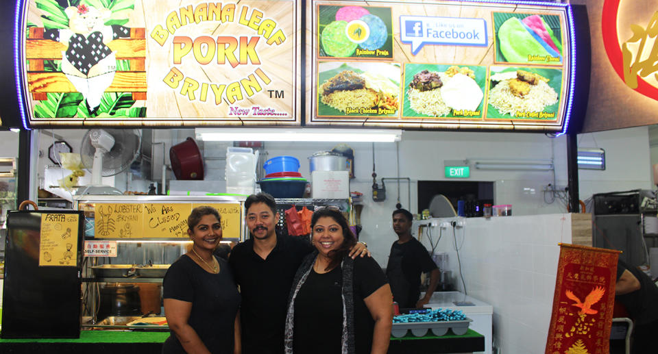 Three of Banana Leaf Pork Briyani co-owners, Meena, Suresh and Maha, at the stall. (Photo: Gabriel Choo / Yahoo Lifestyle Singapore)