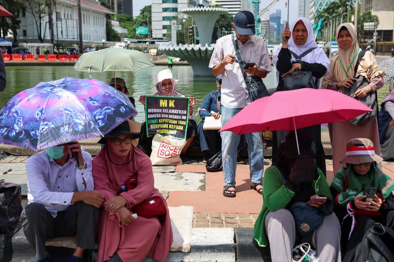 Protest as a court in Indonesia will deliver its verdict on two challenges to the outcome of February's presidential election in Jakarta