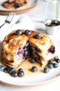 <p>These buttermilk pancakes are perfect: Not too sweet and loaded with blueberries in every. single. bite.</p><p>Get the <a href="https://www.delish.com/uk/cooking/recipes/a32846563/how-to-make-blueberry-pancakes/" rel="nofollow noopener" target="_blank" data-ylk="slk:Blueberry Buttermilk Pancakes;elm:context_link;itc:0;sec:content-canvas" class="link ">Blueberry Buttermilk Pancakes</a> recipe.</p>