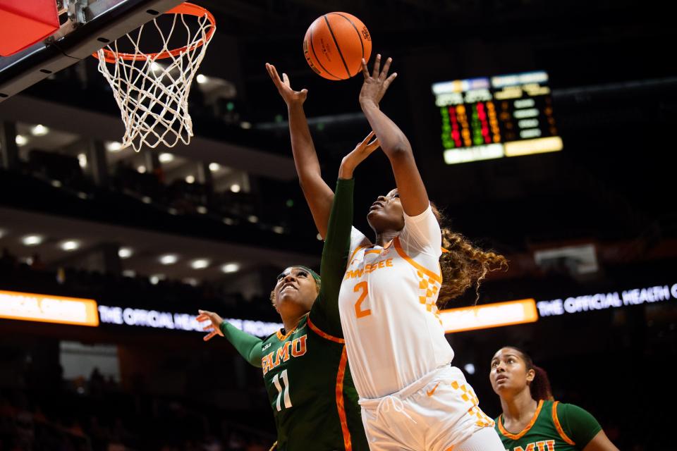 Tennessee forward Rickea Jackson (2) reaches for the rebound over Florida A&M forward Sydney Hendrix (11) during a game between Tennessee and Florida A&M in Knoxville on Tuesday, November 7, 2023.