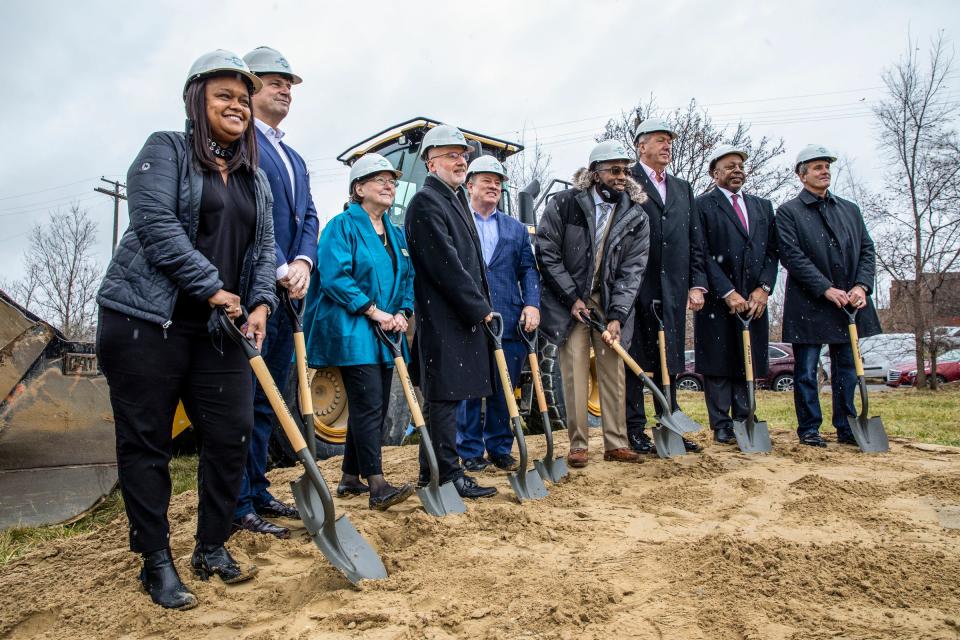 Pamela Alexander, Ford director of community relations; Ford CEO Jim Farley, Julia Burke Foundation Board Member Robbie Murphy, Pope Francis Exec. Dir. Father Tim McCabe, Detroit Mayor Mike Duggan, Detroit Group Exec. For Planning, Housing and Development; Jim Tobin, formerly of Magna International; Founder and CEO of Piston Group Vinnie Johnson and Lear Corp Pres. and CEO Ray Scott during the groundbreaking ceremony for Pope Francis Center's New Bridge Housing Campus to end chronic homelessness in Detroit on Dec. 3, 2021. The campus has received $30 million to build the development with an extra $6 million from the Julia Burke Foundation for extra construction costs.