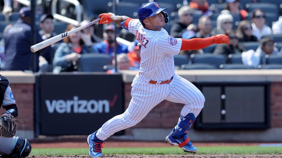 Apr 9, 2023;  New York City, New York, USA;  New York Mets catcher Francisco Alvarez (4) follows through on an RBI single against the Miami Marlins during the second inning at Citi Field.