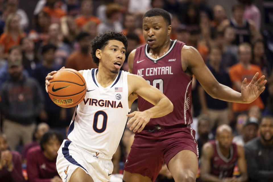 Virginia guard Kihei Clark (0) drives with the ball against North Carolina Central during the first half of an NCAA college basketball game in Charlottesville, Va., Monday, Nov. 7, 2022. (AP Photo/Mike Kropf)