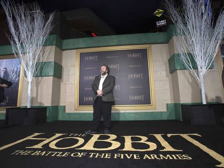 Writer, producer and director Peter Jackson poses at the premiere of "The Hobbit: The Battle of the Five Armies" at Dolby theatre in Hollywood, California December 9, 2014. The movie opens in the U.S. on December 17. REUTERS/Mario Anzuoni