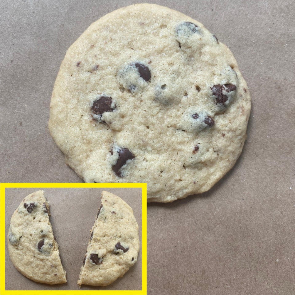 A single chocolate chip cookie with a close-up inset image showing the cookie cut in half