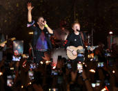 <p>Ed Sheeran performs with Coldplay's Chris Martin, to celebrate the band's forthcoming <em>Music of the Spheres</em> album, at O2 Shepherd's Bush Empire on Oct. 12 in London.</p>