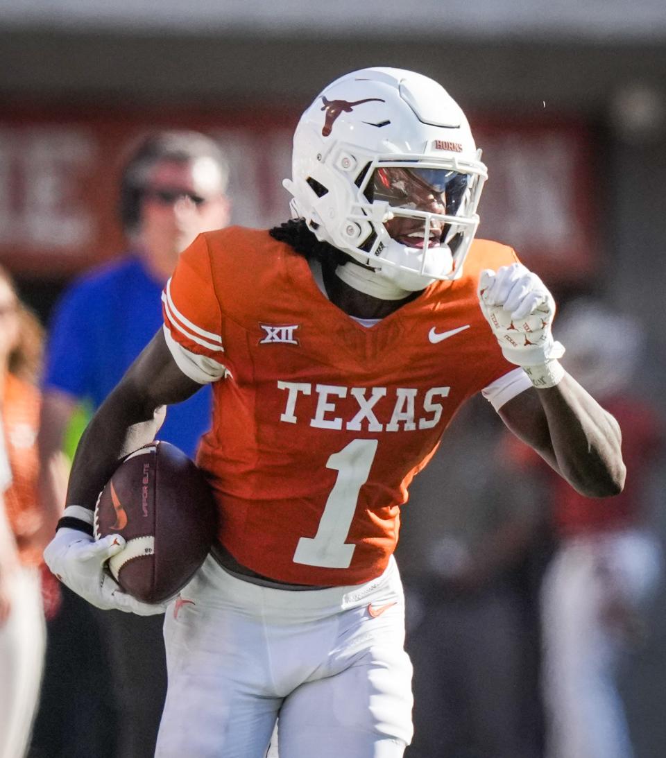 Wide receiver Xavier Worthy, sprinting down the sideline against Kansas, leads Texas with 34 catches and 453 yards receiving.