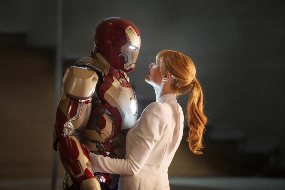 This film publicity image released by Disney-Marvel Studios shows Robert Downey Jr., left, as Tony Stark/Iron Man and Gwyneth Paltrow as Pepper Potts in a scene from "Iron Man 3." (AP Photo/Disney, Marvel Studios)