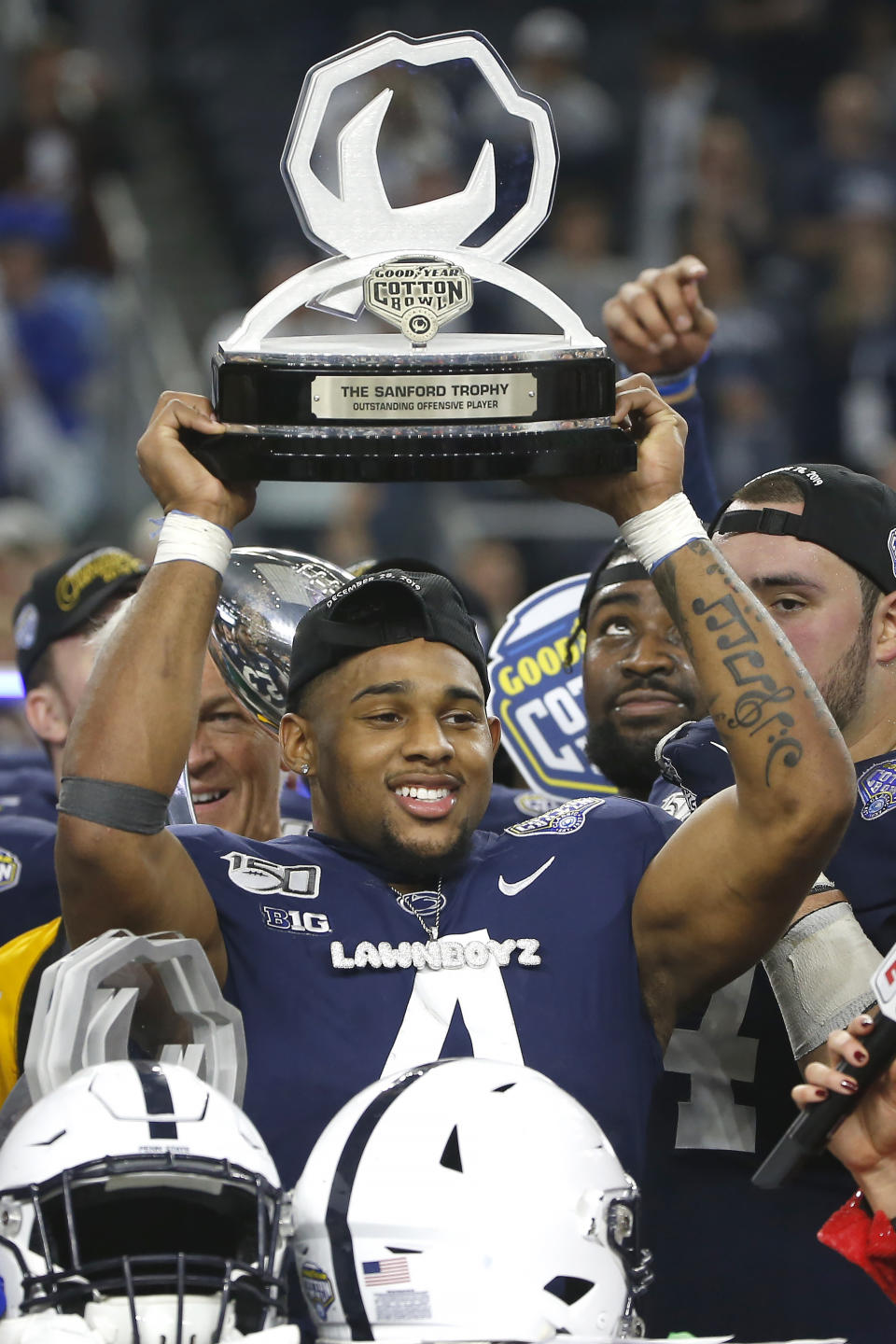 Penn State running back Journey Brown (4) celebrates following the team's 53-39 win over Memphis in an NCAA Cotton Bowl college football game, Saturday, Dec. 28, 2019, in Arlington, Texas. (AP Photo/Ron Jenkins)