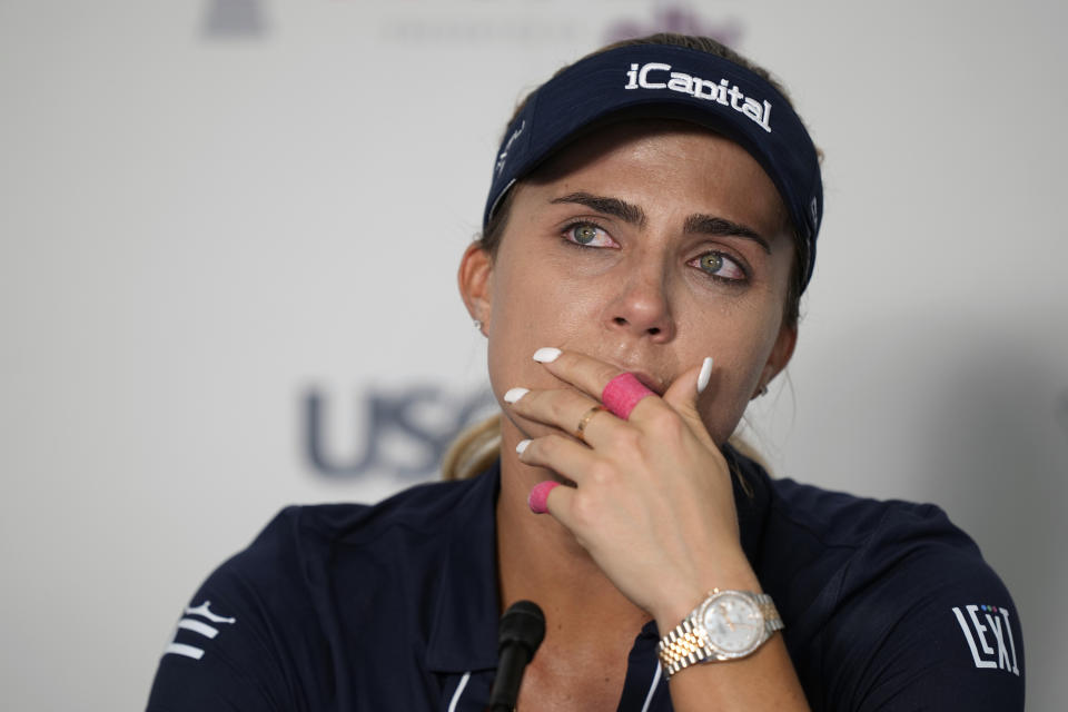 Lexi Thompson pauses while speaking during a news conference at the U.S. Women's Open golf tournament at Lancaster Country Club, Tuesday, May 28, 2024, in Lancaster, Pa. (AP Photo/Matt Rourke)