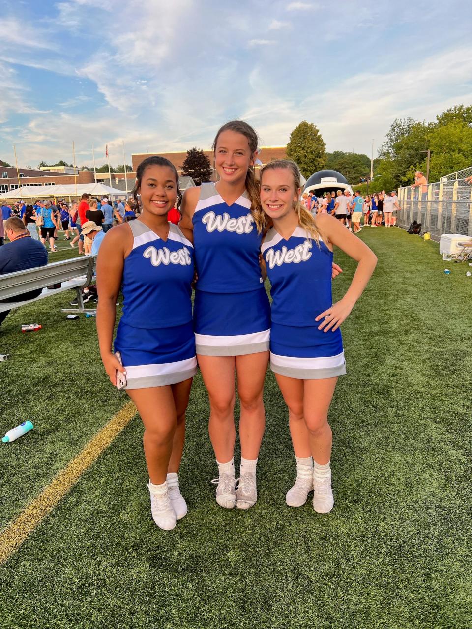 Three Marshwood cheerleaders - Lydia Bowen, Mackenzie Davis and Izzy Varney at the 2022 Maine Shrine Lobster Bowl Classic.