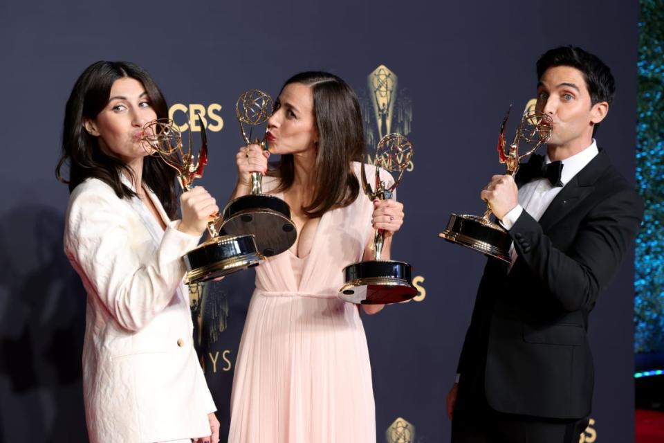 <div class="inline-image__caption"> <p>Jen Statsky, Lucia Aniello, and Paul W. Downs with their Emmy awards.</p> </div> <div class="inline-image__credit"> Rich Fury/Getty </div>