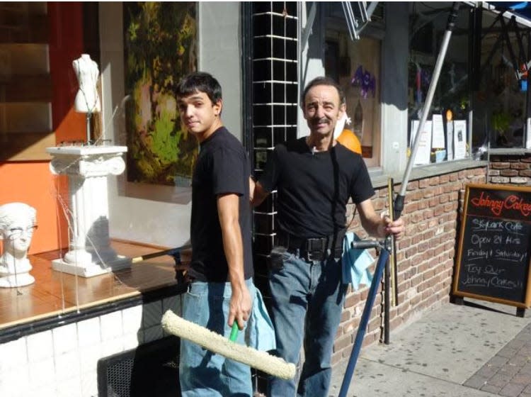 Daniel DeSiero, right, and his son, Daniel, window washing in Nyack.