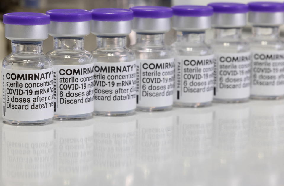 Vials of Biontech-Pfizer's Comirnaty vaccine against COVID-19 are seen during vaccination at the Institute for Health and Food Safety of Zenica, Bosnia and Herzegovina, December 16, 2021. REUTERS/Dado Ruvic