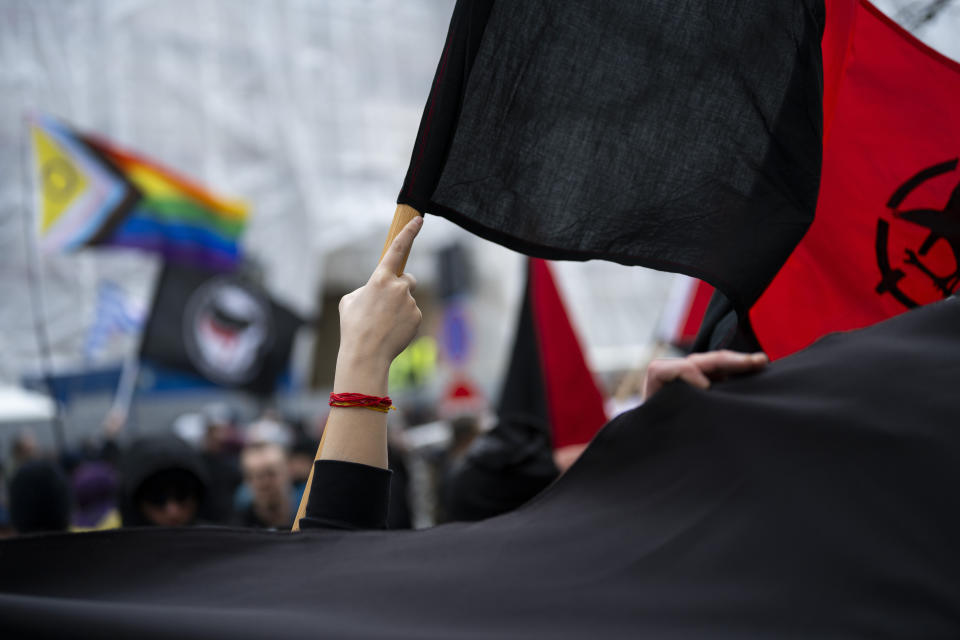 Hundreds of antifascist activists gather in Hungary's capital on Saturday to oppose an annual commemoration held by far-right groups in Budapest, Saturday, Feb. 10, 2024. (AP Photo/Denes Erdos)