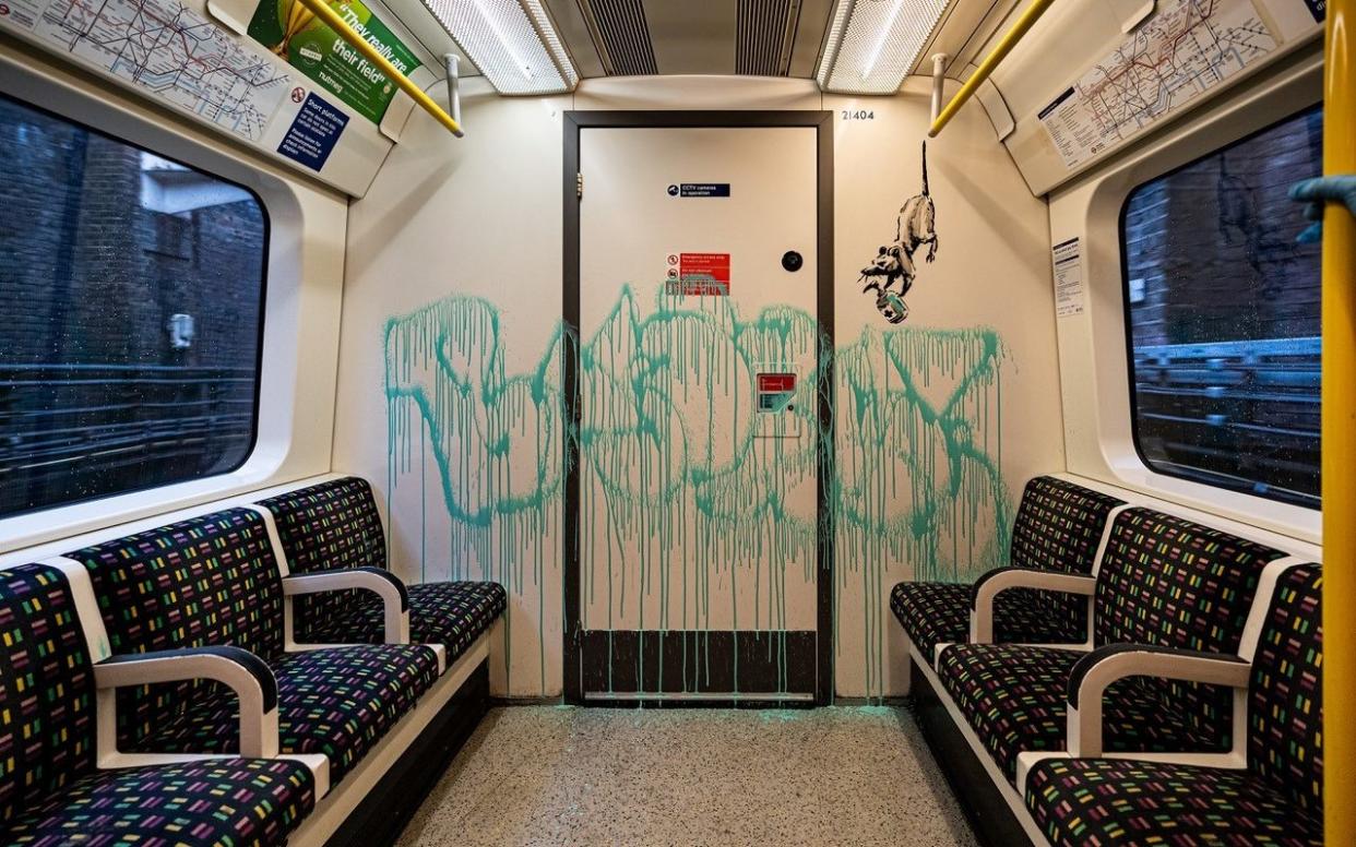 An artwork by Banksy is seen on a London underground carriage, Britain, in this undated picture obtained from social media. Instagram/Banksy /via REUTERS THIS IMAGE HAS BEEN SUPPLIED BY A THIRD PARTY. MANDATORY CREDIT. NO RESALES. NO ARCHIVES - Instagram/Banksy/Reuters