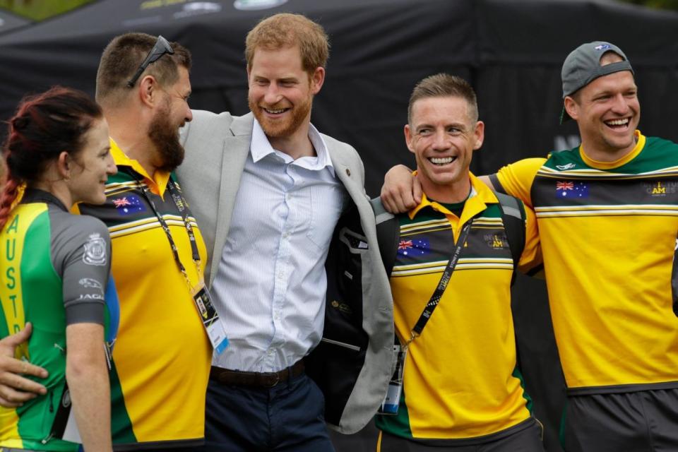 Harry meets Australian Invictus Games competitors during his solo engagement on Sunday (AP)