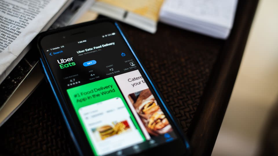 The Uber Eats application on a smartphone arranged in Dobbs Ferry, New York, U.S., on Saturday, Feb. 6, 2021. - Tiffany Hagler-Geard/Bloomberg/Getty Images