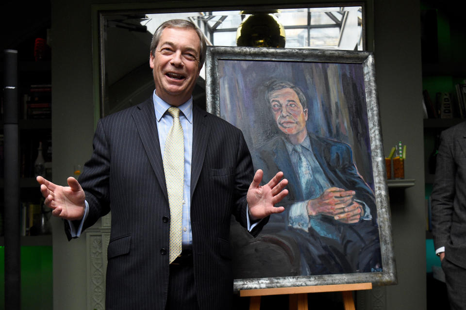 Nigel Farage during the unveiling of his 'Mr Brexit' portrait by artist Dan Llywelyn Hall at L'Escargot Restaurant in London.