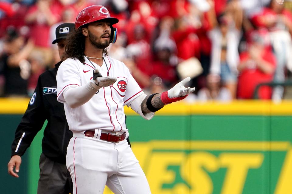 Cincinnati Reds second baseman Jonathan India (6) reacts toward the dugout after hitting a two-run double in the sixth inning during a baseball game against the Cleveland Guardians, Tuesday, April 12, 2022, at Great American Ball Park in Cincinnati, Ohio. 