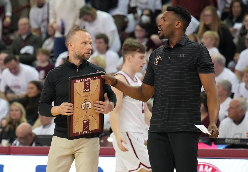 Jan 28, 2023; Charleston, South Carolina, USA; Charleston Cougars head coach Pat Kelsey talks with an assistant in the second half against the Hofstra Pride at TD Arena. Mandatory Credit: David Yeazell-USA TODAY Sports