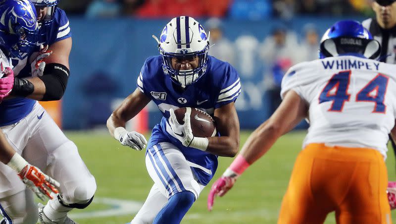 BYU running back Sione Finau runs the ball against the Boise State Saturday, Oct. 19, 2019. Finau is reportedly transferring to Utah State.