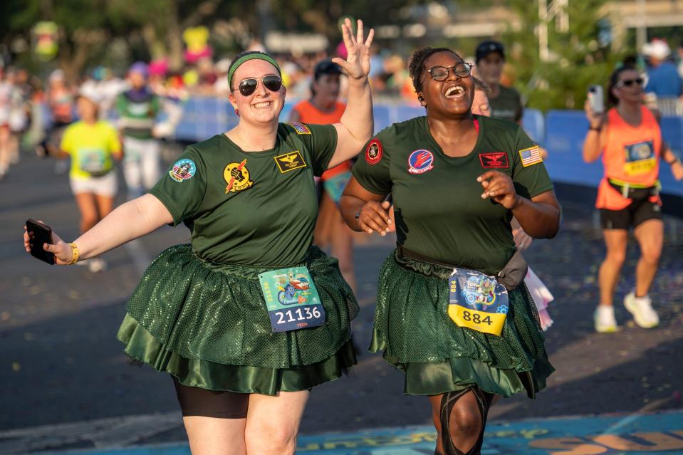 Runners revel crossing the finish line of the Disney Pixar Toy Story 10-Miler during runDisney Springtime Surprise Weekend on April 16 at Walt Disney World.