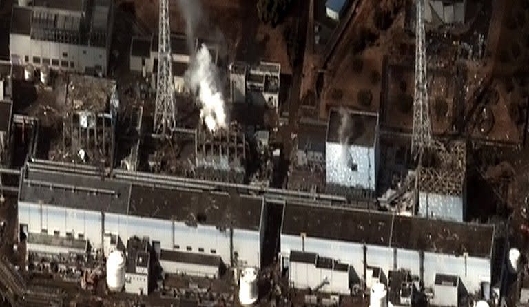 This DigitalGlobe satellite image shows damage at the Fukushima Daiichi Power Plant in Japan. Japanese military helicopters dumped water Thursday from huge buckets onto the stricken Fukushima nuclear power plant in a bid to douse fuel rods, television images showed