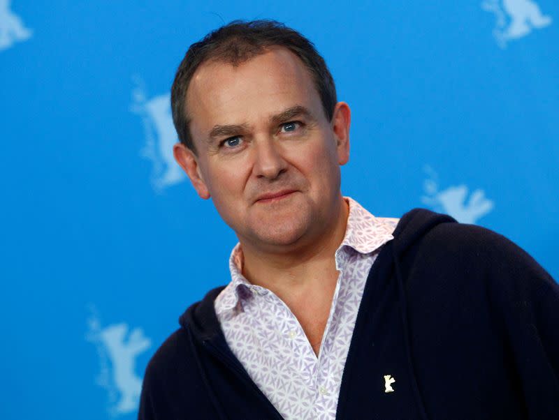 FILE PHOTO: Actor Hugh Bonneville poses during a photocall to promote the movie 'Viceroy' s House' at the 67th Berlinale International Film Festival in Berlin