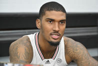 Louisville forward Malik Williams (5) answers questions during the team's NCAA college basketball media day in Louisville, Ky., Tuesday, Oct. 19, 2021. (AP Photo/Timothy D. Easley)