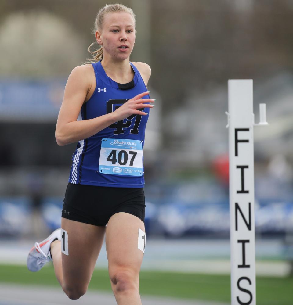Collins-Maxwell's Alexis Houge competes in the 4x100 meter relay during the 112th annual Drake Relays at Drake Stadium Saturday, April 30, 2022 in Des Moines.