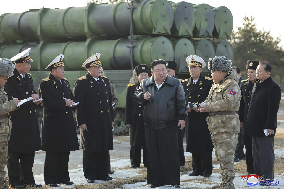 In this photo provided by the North Korean government, North Korean leader Kim Jong Un, front center, provides direction as it conducts a test firing of what it says surface-to-sea missiles in North Korea Wednesday, Feb. 14, 2024. Independent journalists were not given access to cover the event depicted in this image distributed by the North Korean government. The content of this image is as provided and cannot be independently verified. Korean language watermark on image as provided by source reads: "KCNA" which is the abbreviation for Korean Central News Agency. (Korean Central News Agency/Korea News Service via AP)