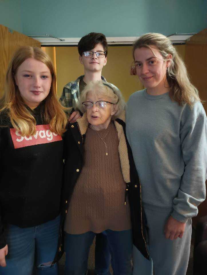 Doris "Ann" Ponder posed with her three grandchildren.