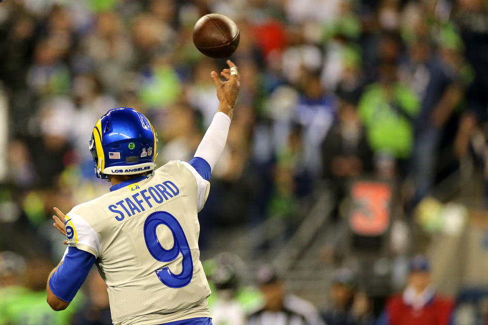 SEATTLE, WASHINGTON - OCTOBER 07: Matthew Stafford #9 of the Los Angeles Rams passes during the fourth quarter against the Seattle Seahawks at Lumen Field on October 07, 2021 in Seattle, Washington. (Photo by Lindsey Wasson/Getty Images)