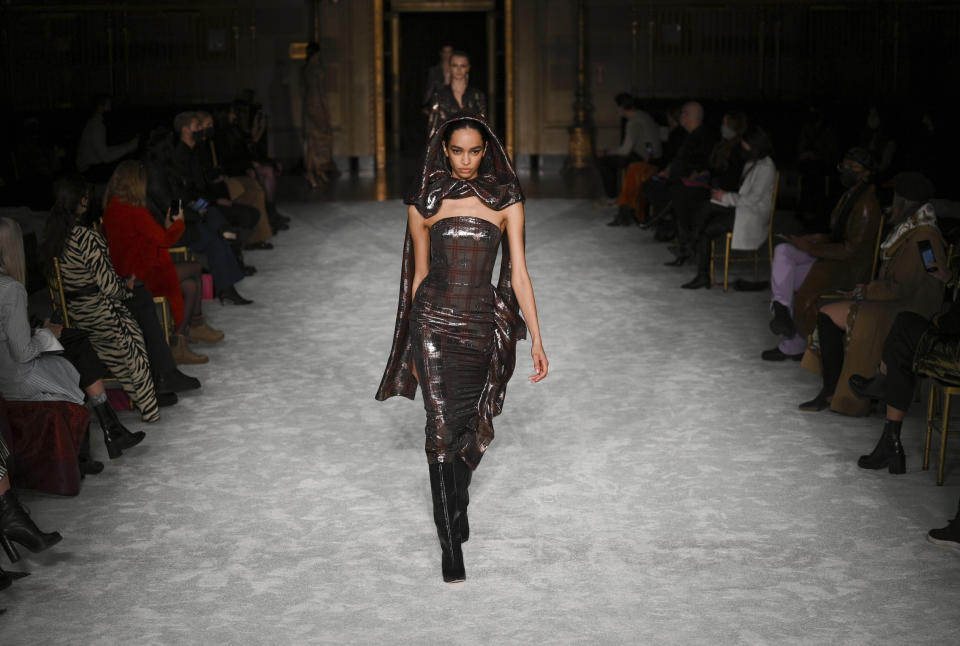 Models walk the runway at the Christian Siriano Fall/Winter 2021 show at Gotham Hall during New York Fashion Week on Thursday, Feb. 25, 2021, in New York. (Photo by Evan Agostini/Invision/AP)