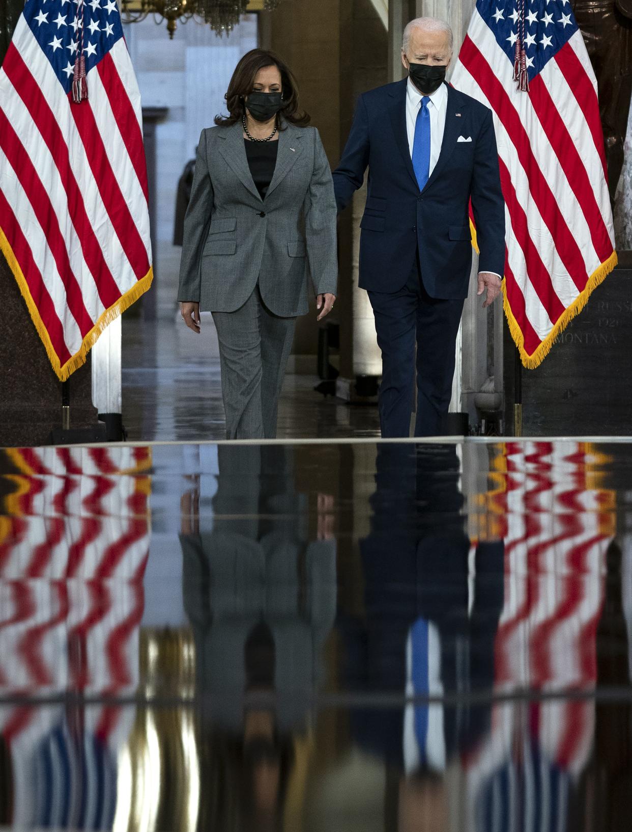 Vice President Kamala Harris and President Joe Biden arrive to give remarks in Statuary Hall of the U.S Capitol on Jan. 6, 2022, in Washington, DC. One year ago, supporters of President Donald Trump attacked the U.S. Capitol Building in an attempt to disrupt a congressional vote to confirm the electoral college win for Joe Biden.