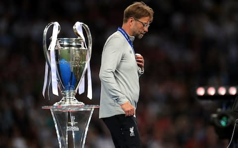 Jurgen Klopp receives his runners-up medal - Credit: Mike Egerton/PA