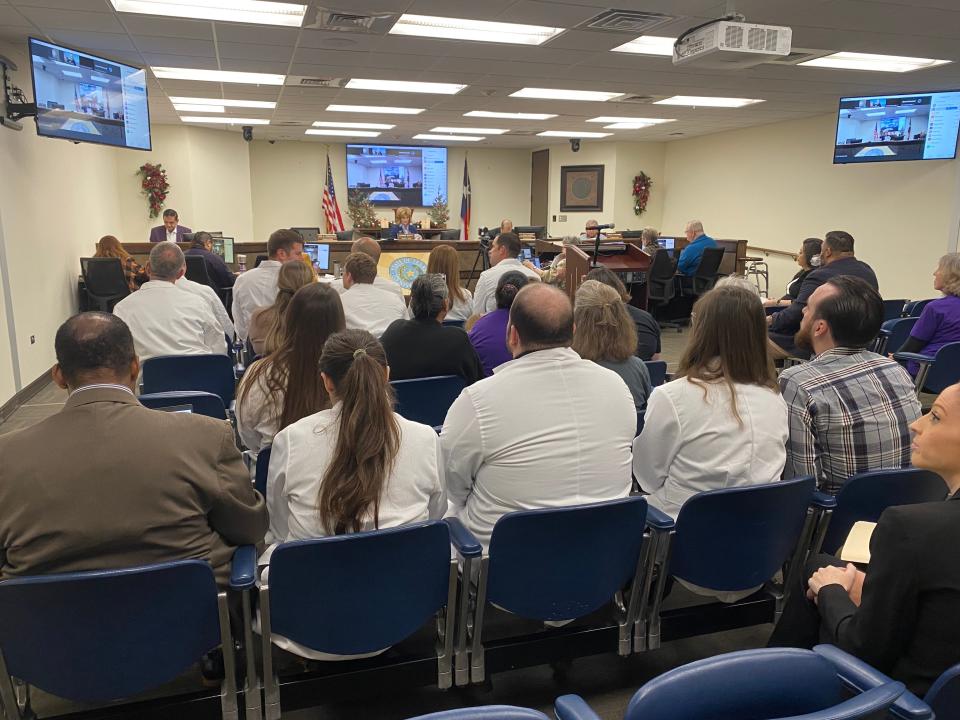 Emergency medicine resident and faculty doctors fill the Nueces County Commissioners Courtroom Wednesday morning to hear an update on efforts to save the emergency medicine residency program at Christus Spohn Shoreline Hospital.