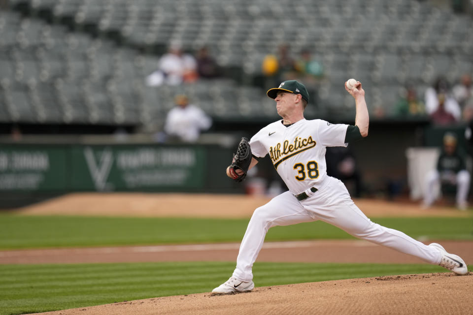 Oakland Athletics pitcher JP Sears throws to a New York Yankees batter during the first inning of a baseball game in Oakland, Calif., Wednesday, June 28, 2023. (AP Photo/Godofredo A. Vásquez)